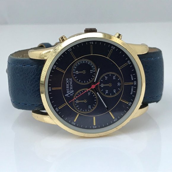 American Exchange Other - American Exchange Men Watch Gold Tone Case Blue Ba